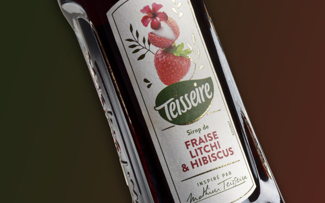 A gourmet label of syrup of strawberry, lychee and hibiscus